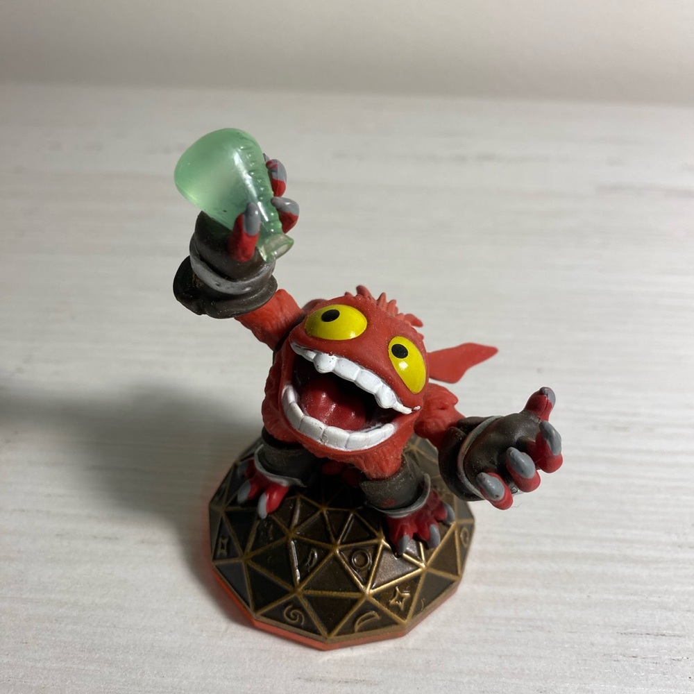 Red and Gold Action Figure
